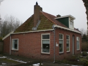 De woning uit 1906 van de familie Ringenoldus op de Warmehoek in de winter van 2010. 